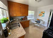 Thumbnail 9 of 16 - Staged kitchen interior