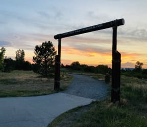 the entrance to the park at sunset