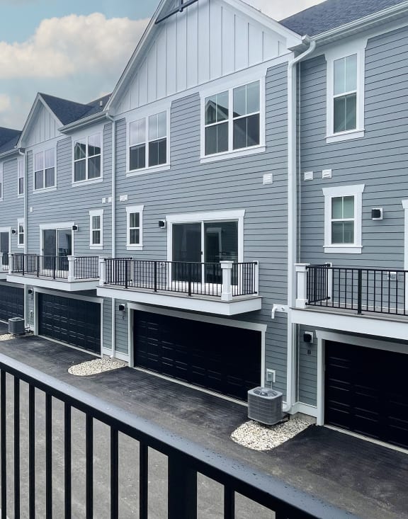 the view of a row of houses from a balcony at Enclave Crystal Lake Townhomes and Apartments, Illinois