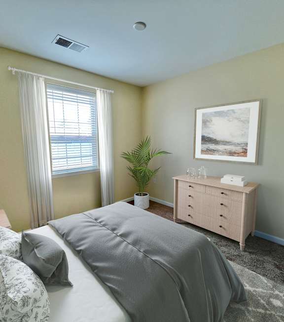 A bedroom with a bed, nightstand, and a painting on the wall.