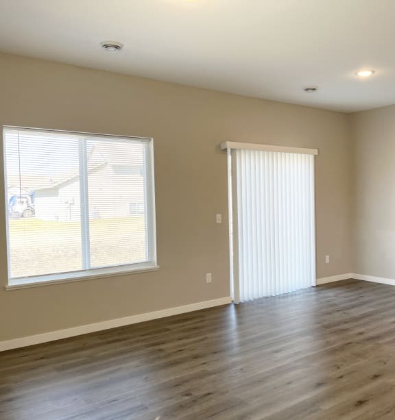 a bedroom with a bed and a ceiling fan