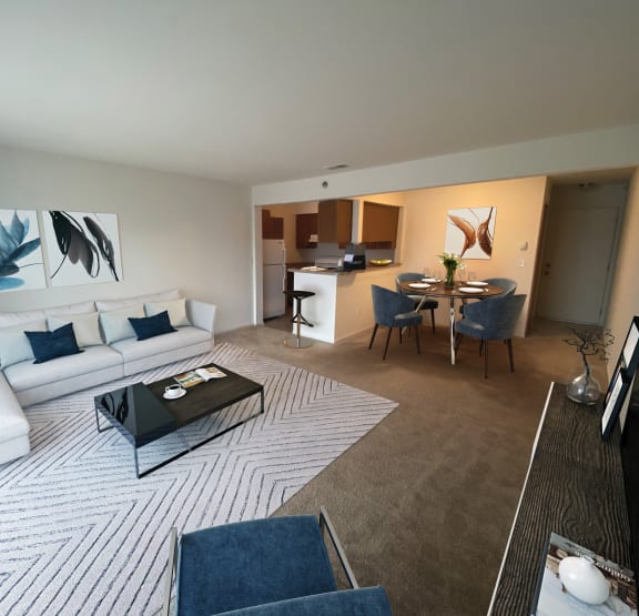 Living Room at Southport Apartments in Belleville, MI 48111