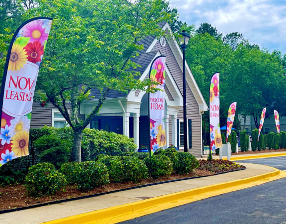 a street with signs in front of a building at Hidden Creek, Georgia