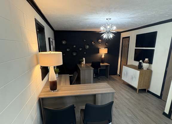 A modern kitchen with a black and white color scheme at Waverly Manor Townhomes, Georgia