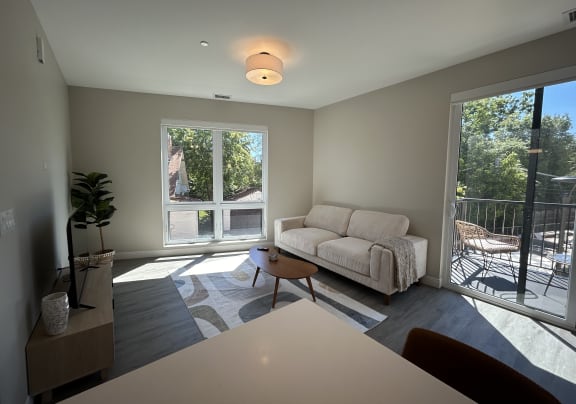 a living room with a couch and a table