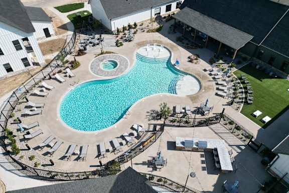 an aerial view of the pool at the resort at longboat key club