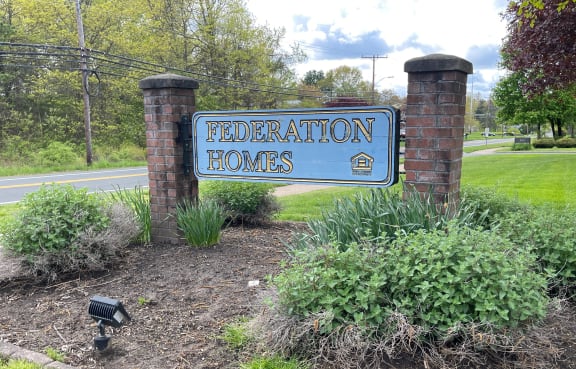 a sign that reads federation homes