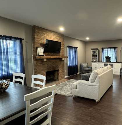 a living room with a couch and a table