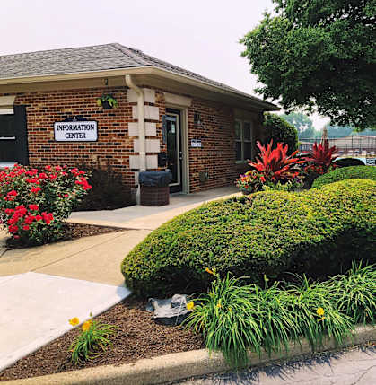 a building with a garden in front of it