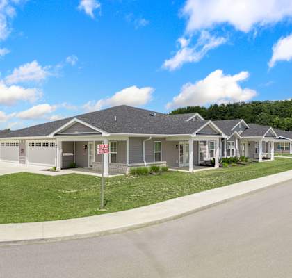 a house with a lawn and a street in front of it at Morada at Maysville, Fort Wayne, Indiana