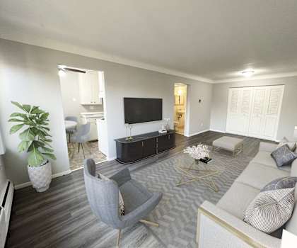 a living room with a couch and a tv