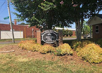 A sign that says Southside in front of a building.