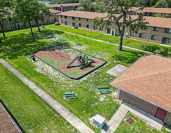 a birds eye view of a playground in a park