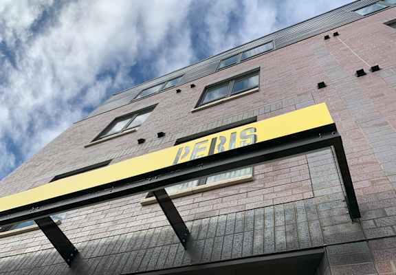 the facade of a building with a sign on it
