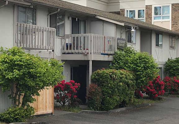 A building with a balcony and a sign that says "Crestview".