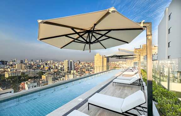 A pool with a view of the city.
