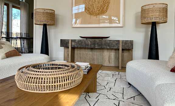 a living room with two couches and a coffee table