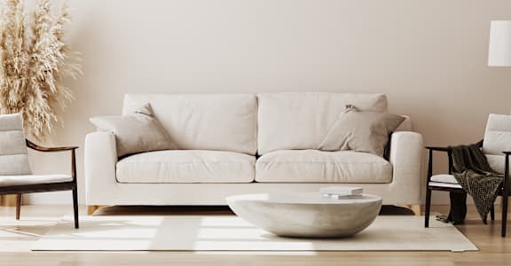 a living room with a couch and a coffee table