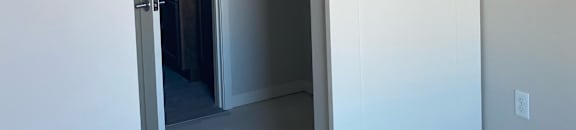 A white ventilation hood is installed in a room.