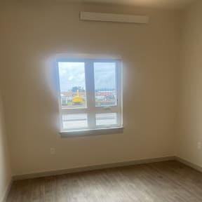 a window on a wall in a room