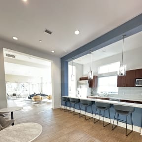 a view of an eating area in the clubhouse at The Bryant Apartments at Yorba Linda, California, 92887