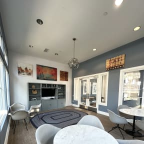 a view from the top down of a living room with a table and chairs at The Bryant Apartments at Yorba Linda, Yorba Linda, CA 92887