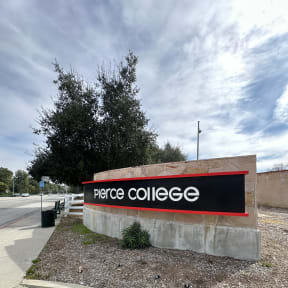 a sign on the side of a building at City View Apartments at Warner Center, Woodland Hills, CA 91367