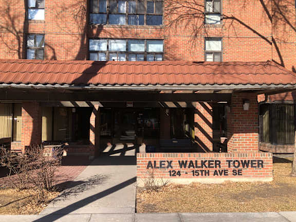 The front of the Alex Walker Tower building at 124-15th Ave SE.