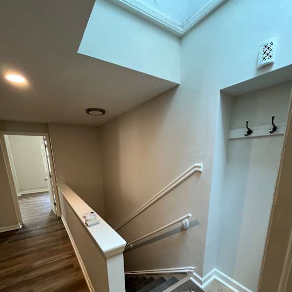 a view from the top of the stairs looking down