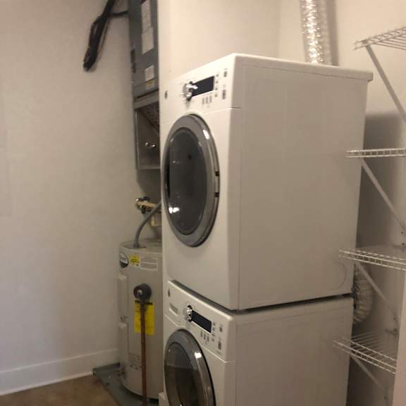 a washing machine and a dryer stacked on top of each other