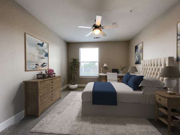 A bedroom with a bed, dresser, and ceiling fan.