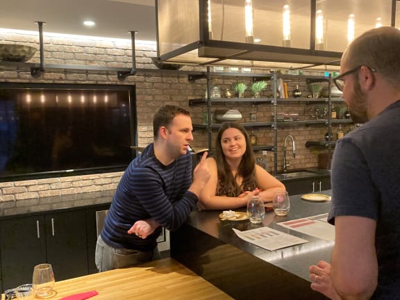 people sitting at a table in a restaurant