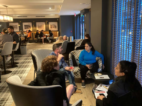 a group of people sitting in a room