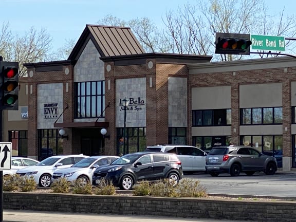 a building with cars parked in front of it