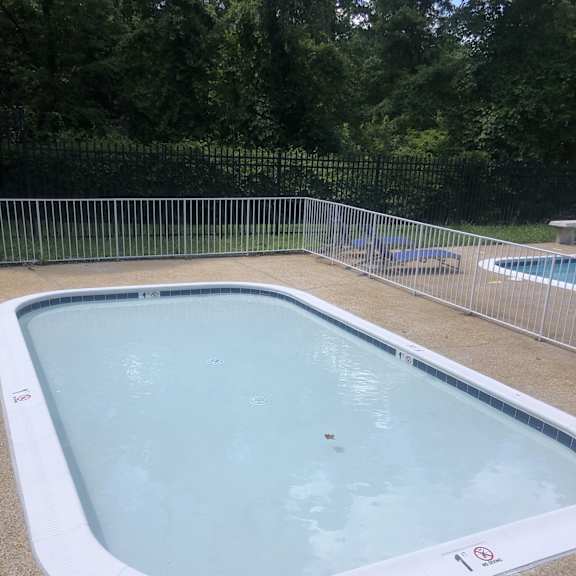 Swimming pool with a white border. at New Carrollton Woods, Riverdale, MD