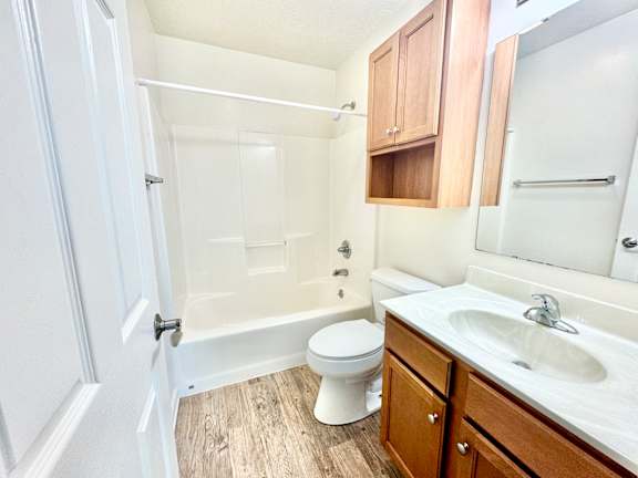 a bathroom with a sink toilet and a shower at Hawthorne Properties in Lafayette, IN 47905