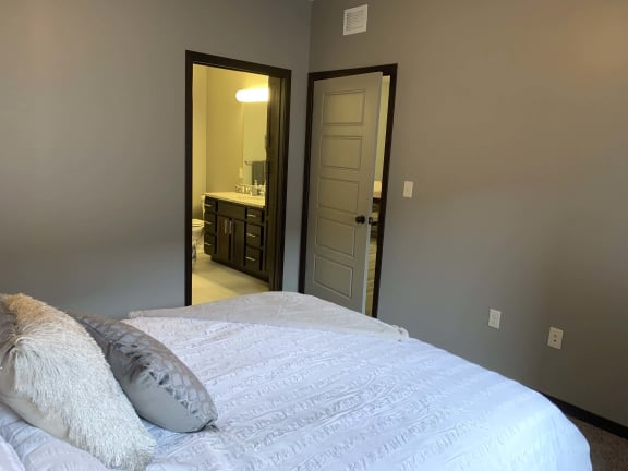 The master bedroom and large bathroom  of the 3 bedroom Harper floor plan at North Pointe Villas in Lincoln NE