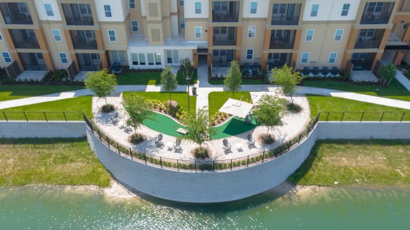 an aerial view of an apartment complex with a miniature golf course