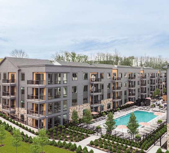 an aerial view of an apartment building with a swimming pool at Stonehill at West Orange, West Orange, New Jersey