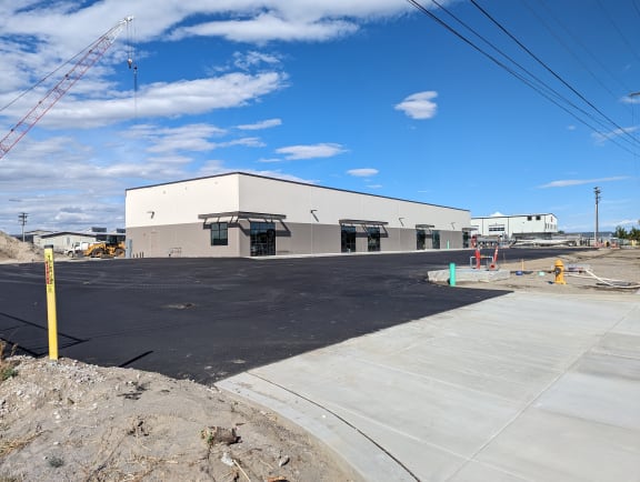 an artist s impression of the parking lot at the new dealership