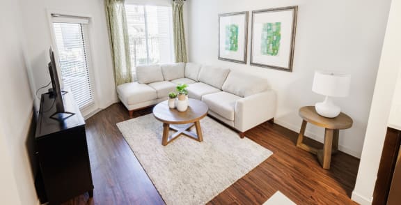 a living room with a couch and a table