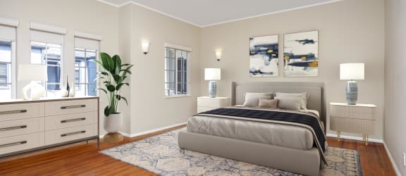a bedroom with a bed and a dresser