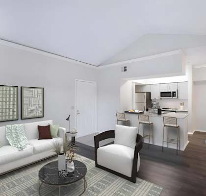 a living room with a couch and a table at Promenade at Carillon, St. Petersburg, Florida