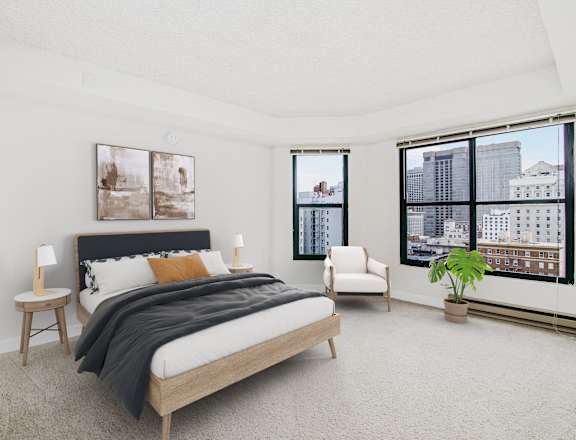 a bedroom with a bed and a large window