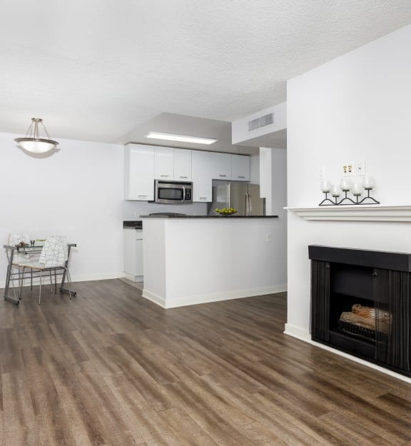 a kitchen with granite countertops and stainless steel appliances
