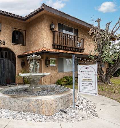 a fountain in front of a building