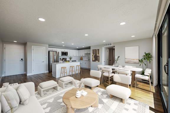 Large furnished and decorated bedroom with wood style floors