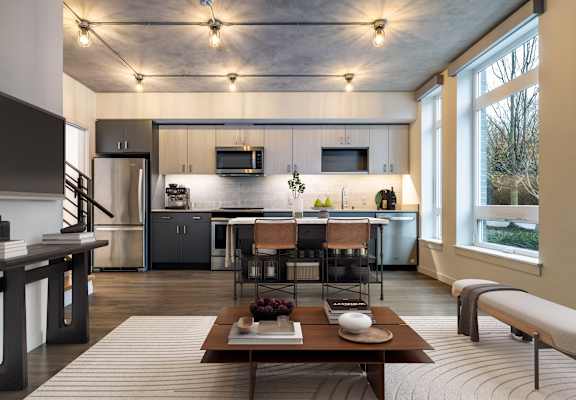 A modern kitchen with a dining table and chairs at Axle, Seattle, WA, 98119