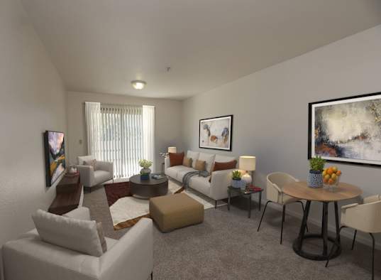 a living room with couches and chairs and a table