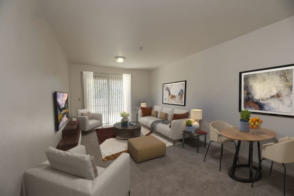 a living room with couches and chairs and a table
